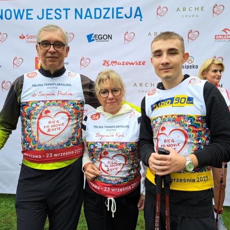 Dr Sz. Pawlak, B. Król oraz Mateusz - pacjent po przeszczepie serca 